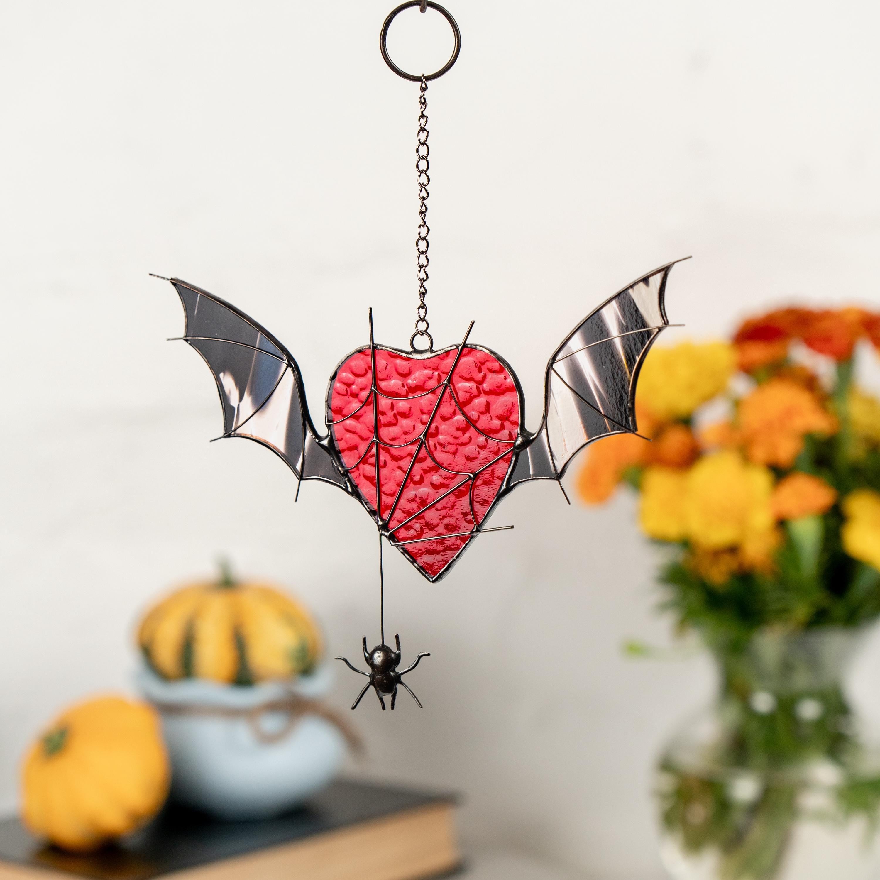 Custom stained glass Halloween artwork Web suncatchers Halloween stained glass window hangings Heart suncatcher