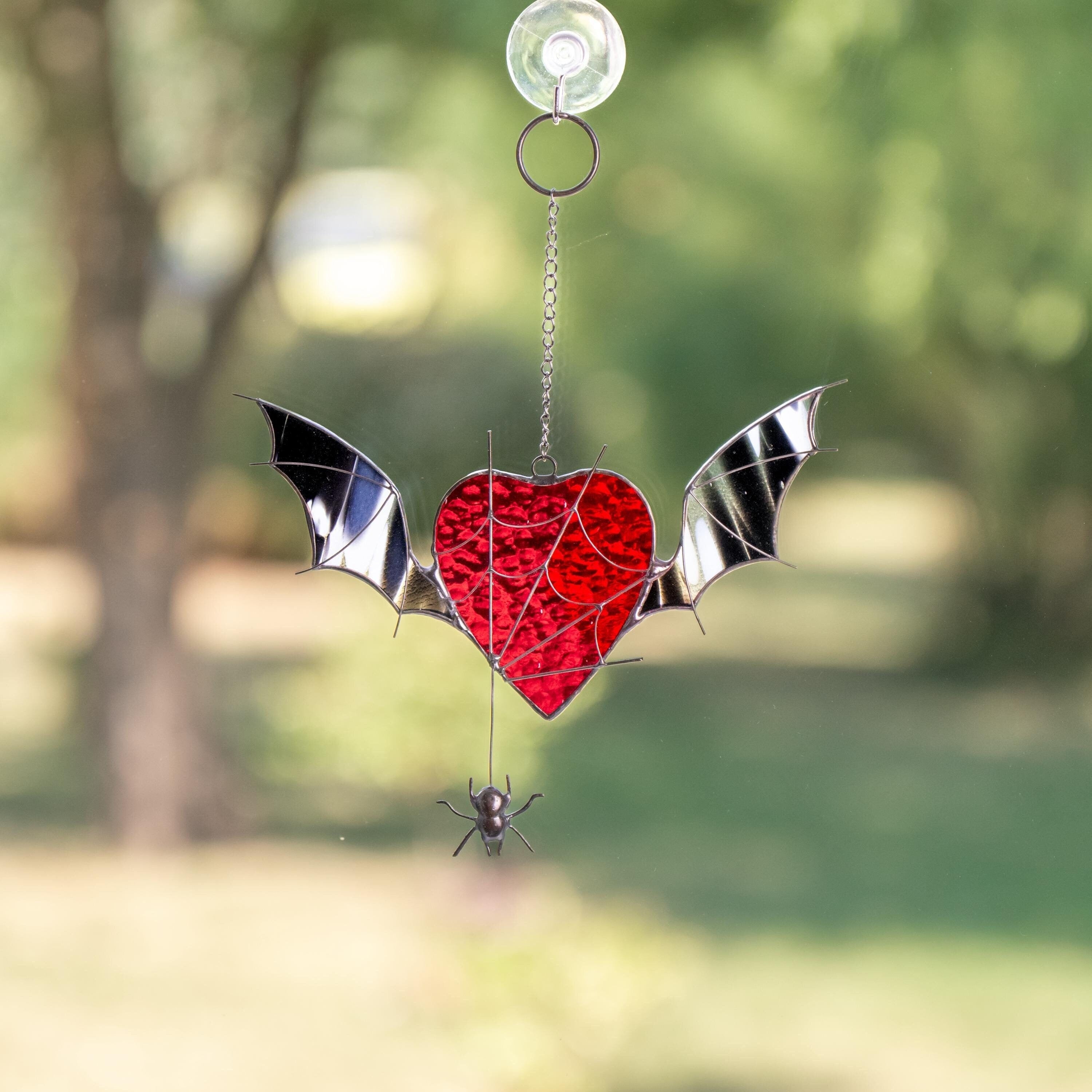Custom stained glass Halloween artwork Web suncatchers Halloween stained glass window hangings Heart suncatcher